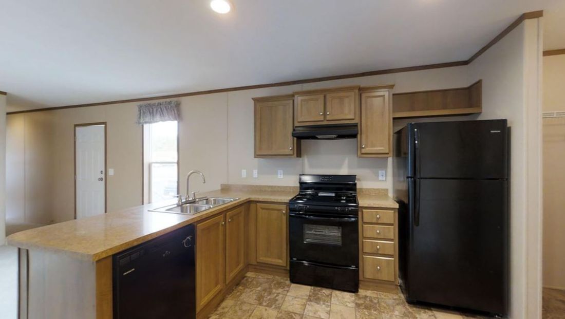 The RUBY Kitchen. This Manufactured Mobile Home features 2 bedrooms and 2 baths.