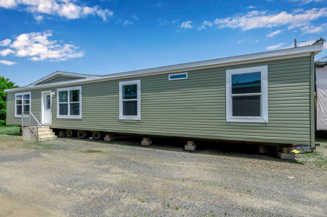 The MIFFLIN 6028-942 Exterior. This Manufactured Mobile Home features 3 bedrooms and 2 baths.