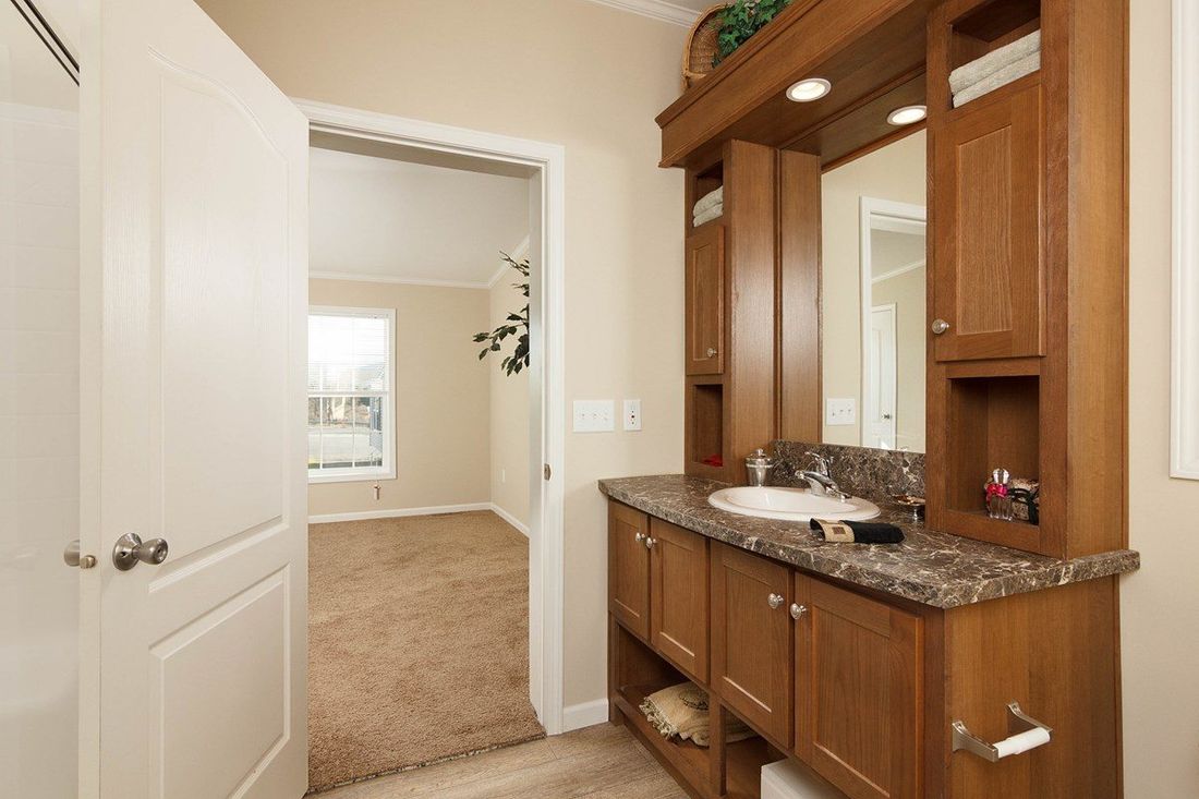 The TRUMAN 5628-68 Master Bathroom. This Manufactured Mobile Home features 3 bedrooms and 2 baths.