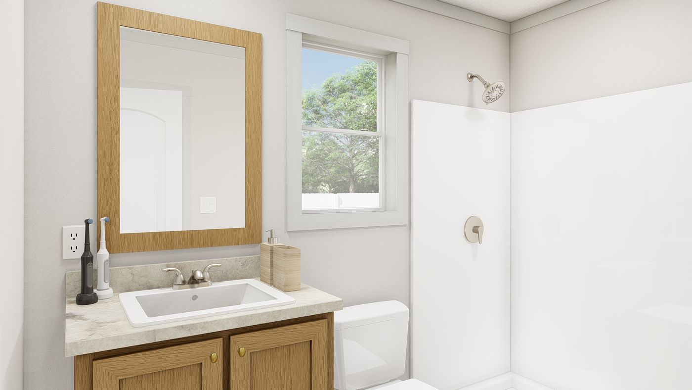 The 1010 "GOOD VIBRATIONS" 6614 Guest Bathroom. This Manufactured Mobile Home features 3 bedrooms and 2 baths.