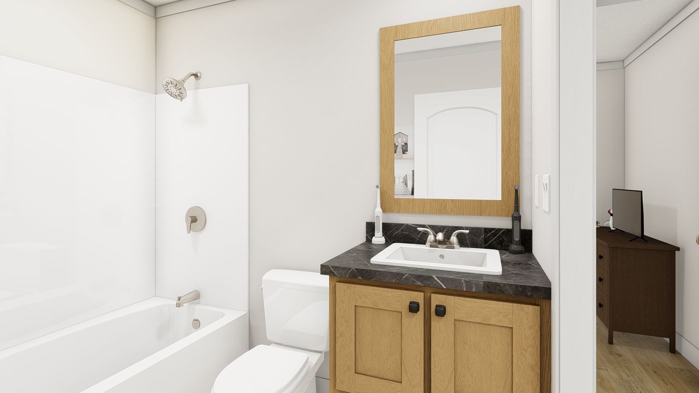 The 1004 "RHYTHM NATION" 6616 Guest Bathroom. This Manufactured Mobile Home features 3 bedrooms and 2 baths.