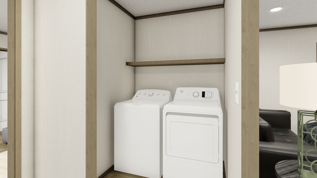 The VOYAGE Utility Room. This Manufactured Mobile Home features 3 bedrooms and 2 baths.