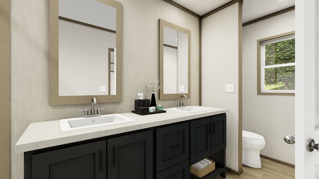 The VOYAGE Primary Bathroom. This Manufactured Mobile Home features 3 bedrooms and 2 baths.