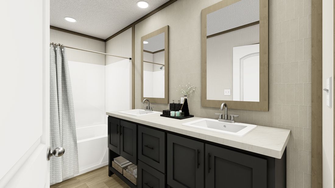 The VOYAGE Primary Bathroom. This Manufactured Mobile Home features 3 bedrooms and 2 baths.